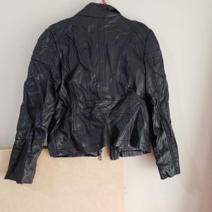 A fake leather kids jacket size 6/7